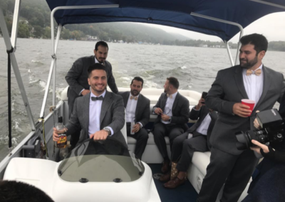 groom and groomsmen on boat